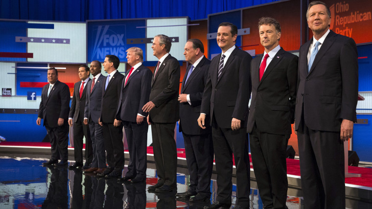 Republican presidential candidates take the stage for the first Republican presidential debate at the Quicken Loans Arena, Aug. 6, 2015, in Cleveland. (Photo by John Minchillo/AP)