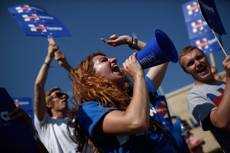 Supporters of Democratic presidential candidate Hillary Clinton rally outside the Iowa Democratic Wing Ding in Clear Lake, Iowa on Aug. 14, 2015 (Photo by Win McNamee/AP).