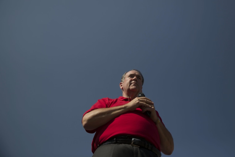 Mike Huckabee, Republican presidential candidate, speaks to attendees at the Iowa State Fair Soapbox in Des Moines, Ia., U.S., Aug. 13, 2015. (Photo by Daniel Acker/Bloomberg/Getty)