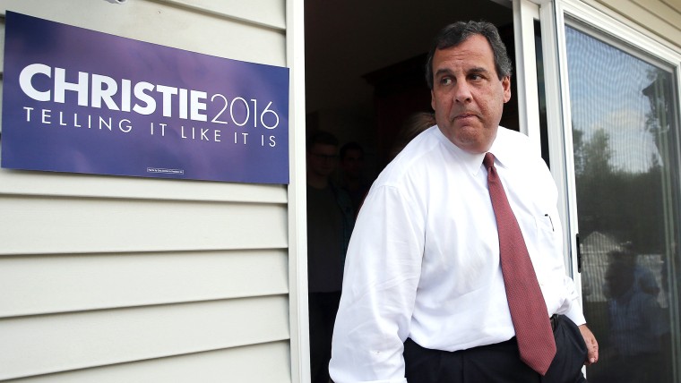 Republican presidential candidate New Jersey Gov. Chris Christie arrives in the backyard at a house party in Salem, N.H., July 17, 2015. (Photo by Winslow Townson/AP)