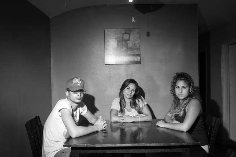 Rachel Ullah, center, who successfully completed the program at the Brooklyn Drug Court, with her children, Josè and Tatiana Santos, at their Staten Island home. Josè is 19 and Tatiana, 21. (Photo by John Trotter for MSNBC)