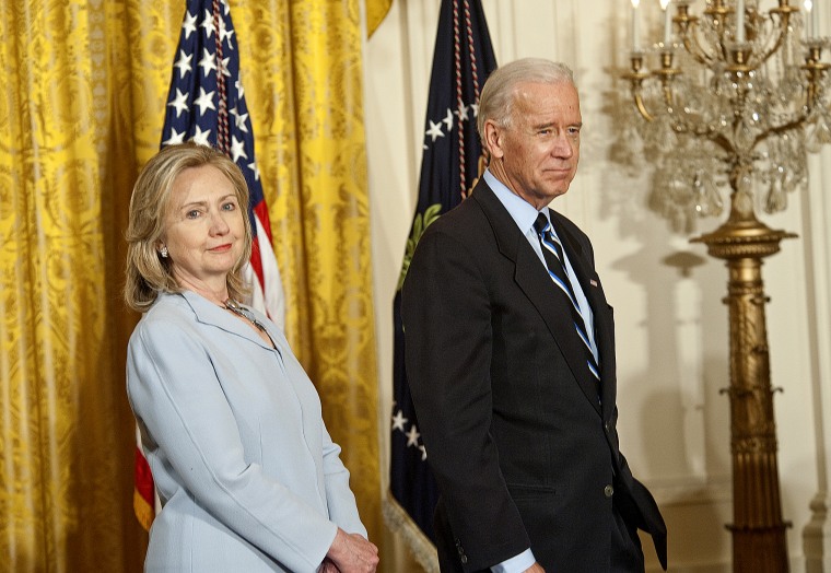 Then-Secretary of State Hillary Clinton and Vice President Joe Biden at the White House, Washington, D.C., April 28, 2011. (Photo by Rex Features/AP)