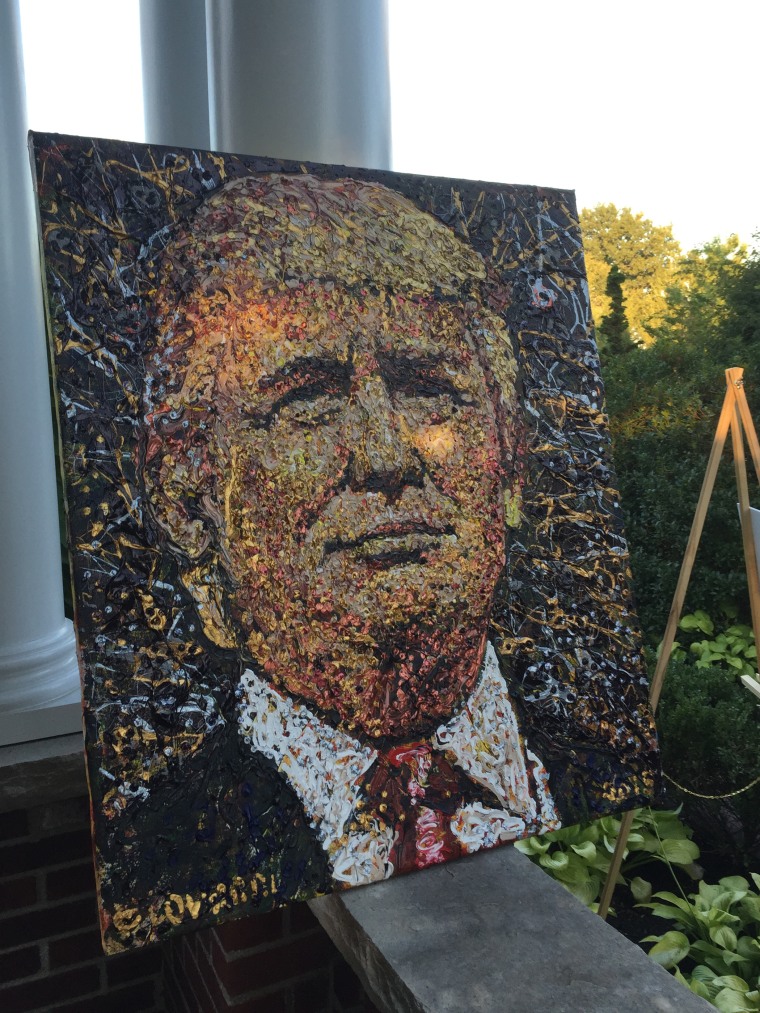 An expressionist-style portrait of Donald Trump, a painting the artist was gifting to the night's host at the event in Norwood, Mass. (Photo by Kailani Koenig)