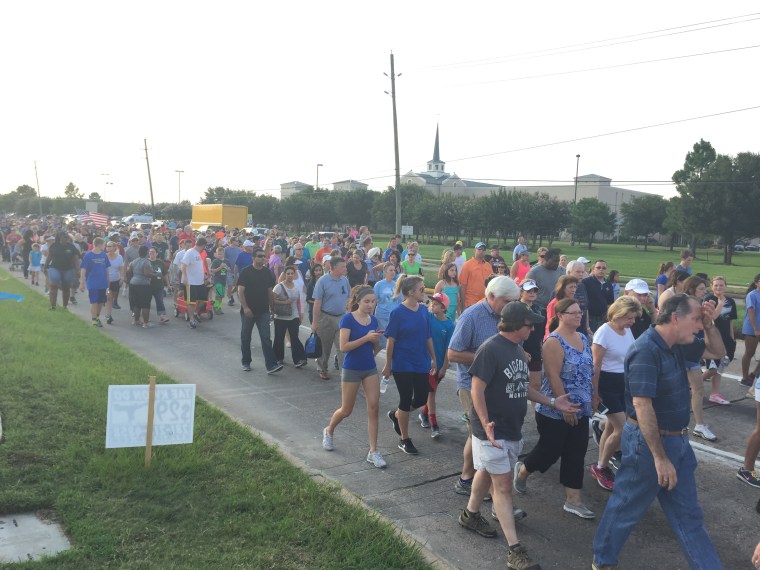 Several thousand people march along West Road, in northwest Houston, on Aug. 30, 2015. (Photo by  James Novogrod/msnbc)