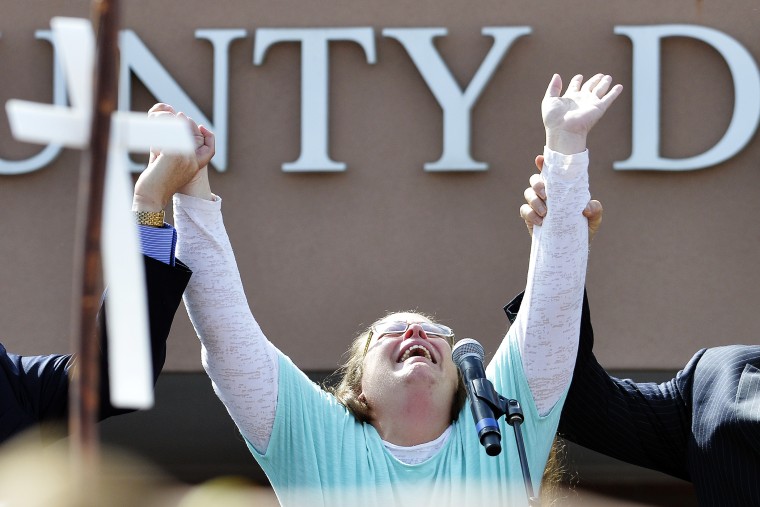 Rowan County Clerk Kim Davis cries out after being released from the Carter County Detention Center, Tuesday, Sept. 8, 2015, in Grayson, Ky. (Photo by Timothy D. Easley/AP)