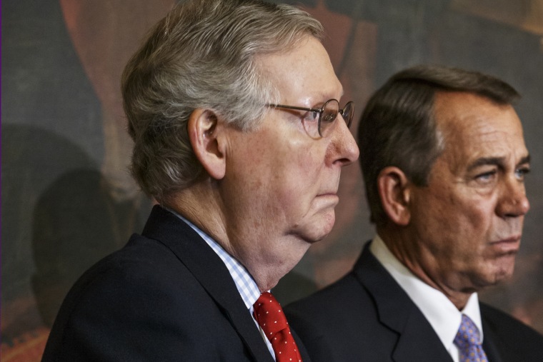 Senate Majority Leader Mitch McConnell of Ky., left, and House Speaker John Boehner of Ohio, stand together on Capitol Hill in Washington on Feb. 13, 2015. (Photo by J. Scott Applewhite/AP)