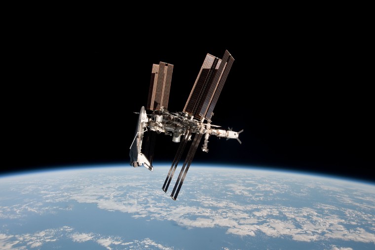 In this photo, the Space Shuttle Endeavour is seen docked on its last trip to the International Space Station in May 2011. (Photo by NASA)