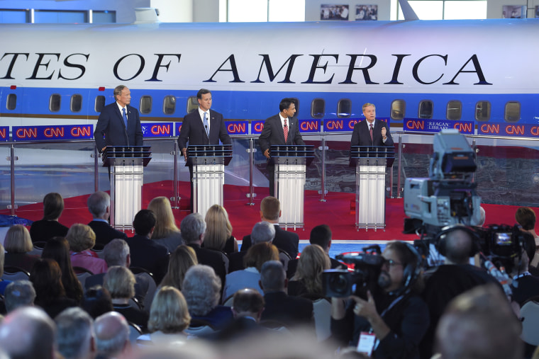 Republican presidential candidates appear during the CNN Republican presidential debate at the Ronald Reagan Presidential Library and Museum on Sept. 16, 2015, in Simi Valley, Calif. (Photo by Mark J. Terrill/AP)