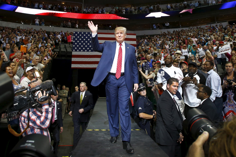 Republican presidential candidate Donald Trump enter the arena for a rally in Dallas, Texas Sept. 14, 2015. (Photo by Mike Stone/Reuters)