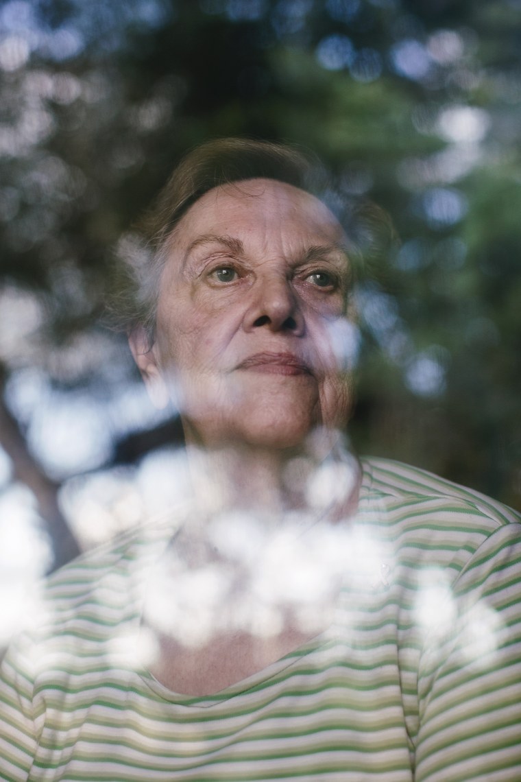 Pamela Taylor looks out of her front window where it's common for her to see immigrants crossing her property, in Brownsville, Texas. (Photo by Bryan Schutmaat for MSNBC)