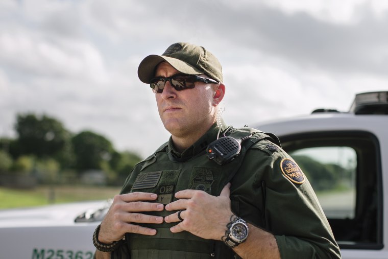 Pat Reilly, boarder patrol agent, stationed in Hidalgo, Texas, monitors the region. (Photo by Bryan Schutmaat for MSNBC)