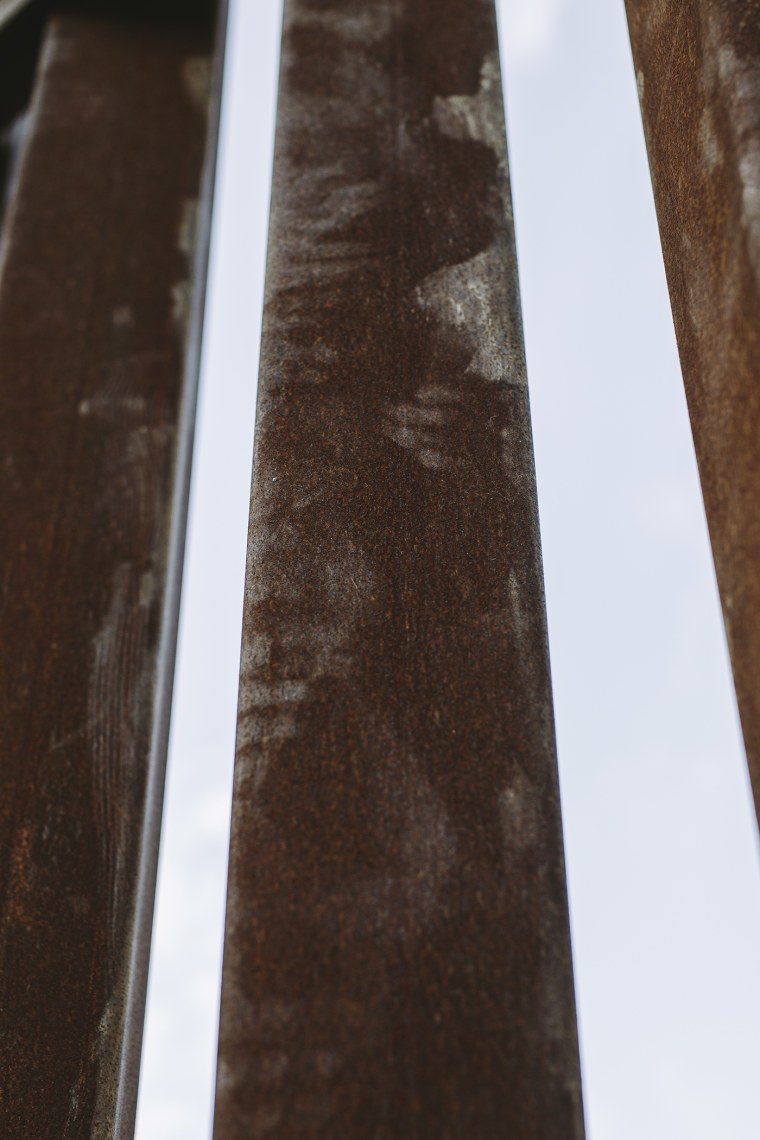 Hand prints and scuffs marks accent the border fence in Hidalgo, Texas. (Photo by Bryan Schutmaat for MSNBC)