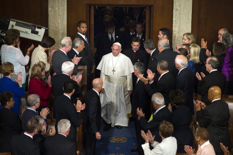 Pope Francis (C) enters the U.S. House of Representatives prior to a much anticipated speech to Congress in the U.S. Capitol in Washington D.C., on Sept. 24, 2015. (Photo by Jim Lo Scalzo/EPA)