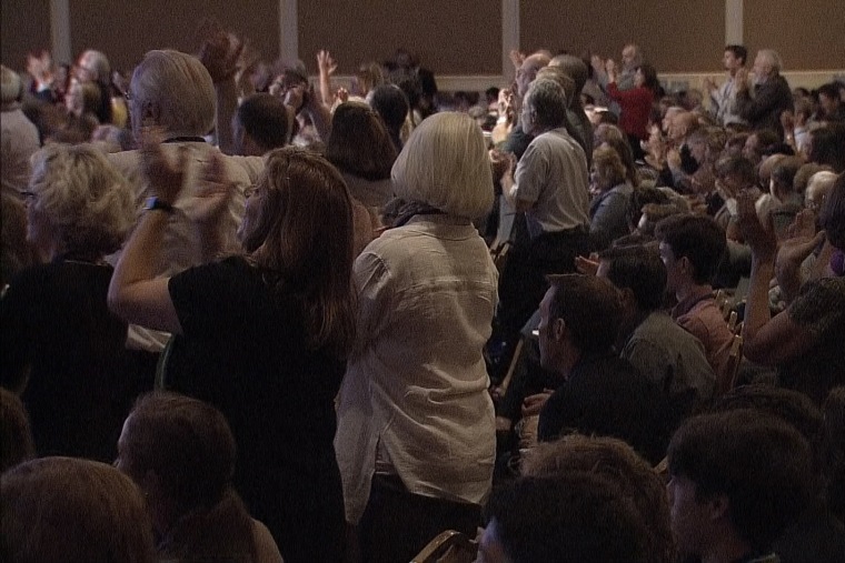 A conservative crowd applauds news of John Boehner's resignation, at the Values Voters Summit in Washington, D.C., Sept. 25, 2015.