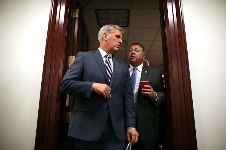 House Majority Leader Rep. Kevin McCarthy (R-CA) (L) talks to Rep. Bill Shuster (R-PA) (R) as they come out after a House Republican Conference meeting on Sept. 29, 2015 at the U.S. Capitol in Washington, D.C. (Photo by Alex Wong/Getty)