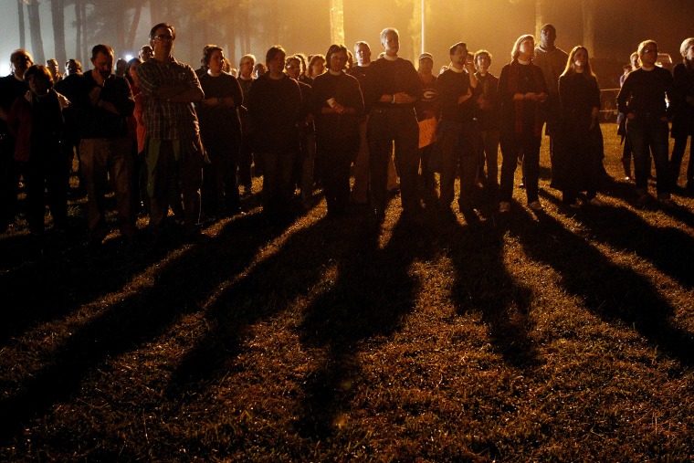 Supporters of Kelly Gissendaner sing hymns as they continue their wait into the night for the execution of Gissendaner at the Georgia Diagnostic and Classification Prison in Jackson, Ga., Sept. 29, 2015. (Photo by Tami Chappell/Reuters)