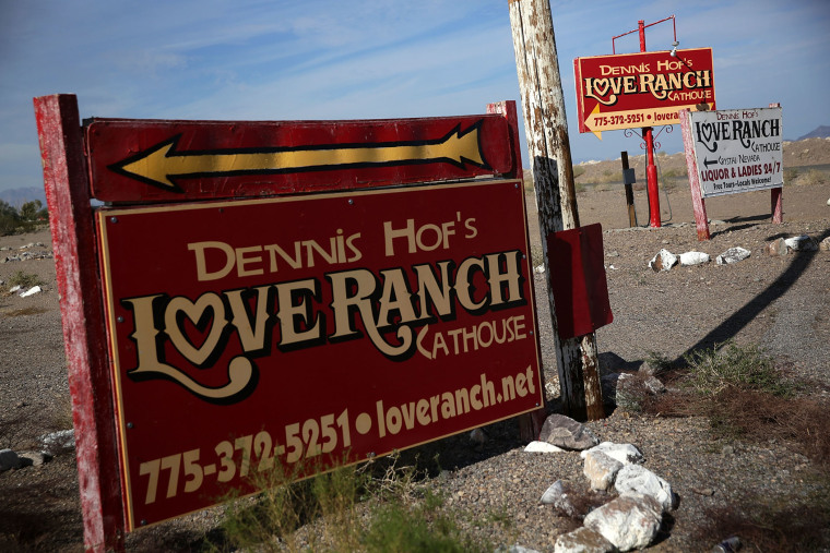 Signs for Dennis Hof's Love Ranch Las Vegas brothel are shown on Oct. 14, 2015 in Crystal, Nev. (Photo by Alex Wong/Getty)