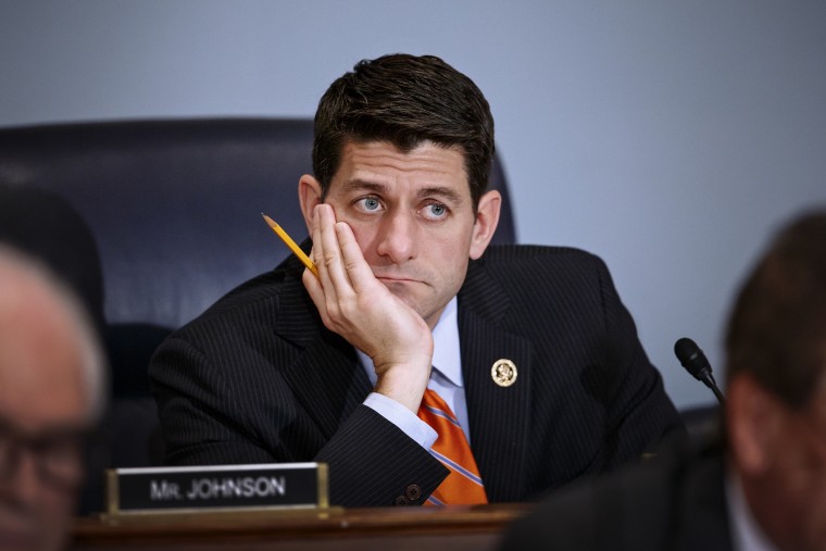 House Ways and Means Committee Chairman Paul Ryan, R-Wisc., listens as Treasury Secretary Jack Lew defends President Barack Obama's new budget proposals, on Capitol Hill in Washington, Feb. 3, 2015. (Photo by J. Scott Applewhite/AP)