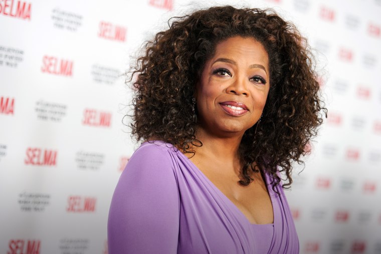 In this Dec. 6, 2014 file photo, Oprah Winfrey arrives at Selma And The Legends That Paved The Way Gala in Goleta, Calif. (Photo by Richard Shotwell/Invision/AP)