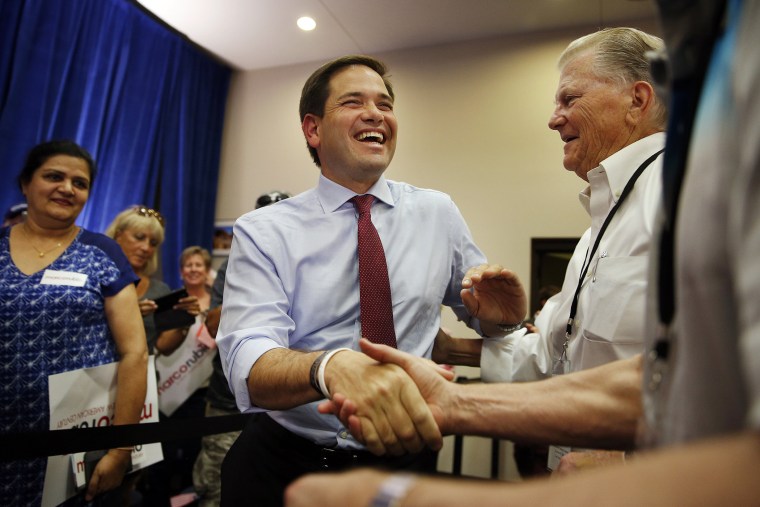 Republican presidential candidate, Sen. Marco Rubio, R-Fla., shakes hands at a campaign event, Oct. 8, 2015, in Las Vegas, Nev. (Photo by John Locher/AP)