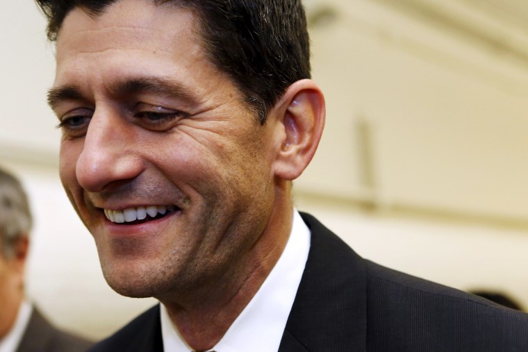 U.S. Representative Paul Ryan (R-WI) smiles as he walks at the end of the day of the House Freedom Caucus meeting on Capitol Hill in Washington Oct. 21, 2015. (Photo by Yuri Gripas/Reuters)