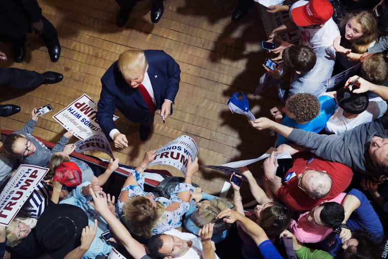 Republican presidential candidate Donald Trump greets guests after speaking at a campaign rally at Burlington Memorial Auditorium on Oct. 21, 2015 in Burlington, Iowa. (Photo by Scott Olson/Getty)
