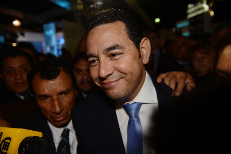Jimmy Morales, the National Front of Convergence party presidential candidate, arrives to the Electoral Supreme Court headquarters in Guatemala City, Oct. 25, 2015. (Photo by Oliver de Ros/AP)