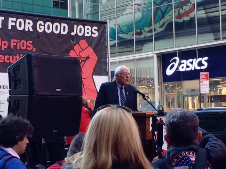 Democratic presidential candidate Bernie Sanders speaks to Verizon workers picketing outside one of the company's offices, Oct. 26, 2015. (Photo by Aliyah Frumin)