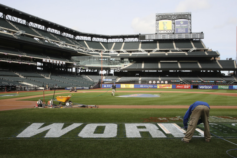 Grounds crew prepare Citi Field for the Major League Baseball World Series between the New York Mets and the Kansas City Royals, Oct. 27, 2015, in New York. (Photo by Mary Altaffer/AP)