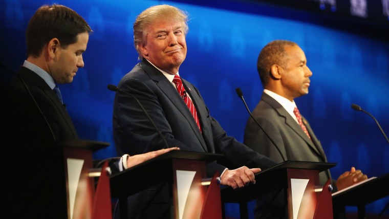 Presidential candidate Donald Trump smiles while Sen. Marco Rubio (L) and Ben Carson look on during the CNBC Republican Presidential Debate, Oct. 28, 2015 in Boulder, Colo. (Photo by Justin Sullivan/Getty)
