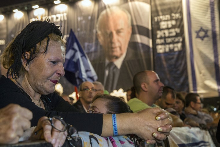 A woman reacts during a commemorative rally in memory of late Israeli prime minister Yitzhak Rabin, at Rabin Square in the Israeli coastal city of Tel Aviv on Oct. 31, 2015.(Photo byb Jack Guez/AFP/Getty)
