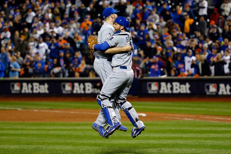 Wade Davis #17 of the Kansas City Royals celebrates with Drew Butera #9 of the Kansas City Royals after defeating the New York Mets to win Game Five of the 2015 World Series at Citi Field on Nov. 1, 2015 in New York. N.Y. (Photo by Al Bello/Getty)