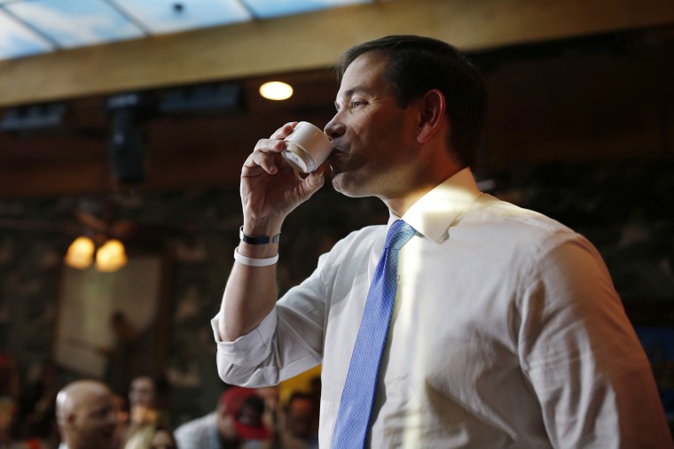 Republican presidential candidate Sen. Marco Rubio, R-Fla., enjoys a coffee while speaking at an event at a restaurant, Oct. 9, 2015, in Las Vegas. (Photo by John Locher/AP)