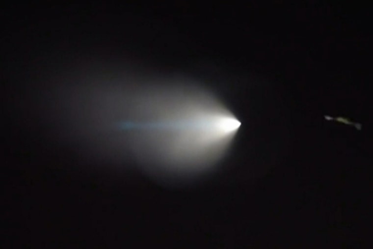 This Saturday, Nov. 7, 2015, image from video, shows an unarmed missile fired by the U.S. Navy from a submarine off the coast of Southern Calif. (Photo by Julien Solomita/AP)