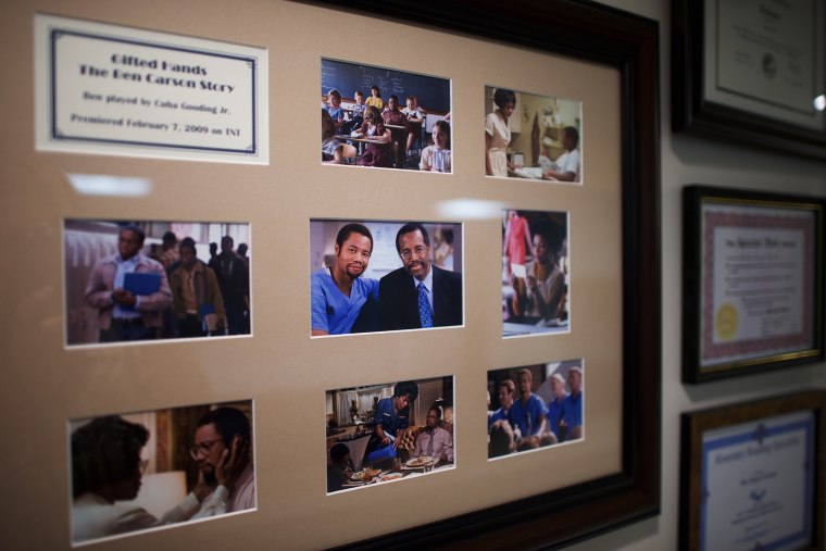Stills from Gifted Hands: The Ben Carson Story, a 2009 TV movie starring Cuba Gooding Jr., are framed in Dr. Benjamin Carson's residence in Upperco, Md. on Nov. 27, 2014. (Photo by Mark Makela)