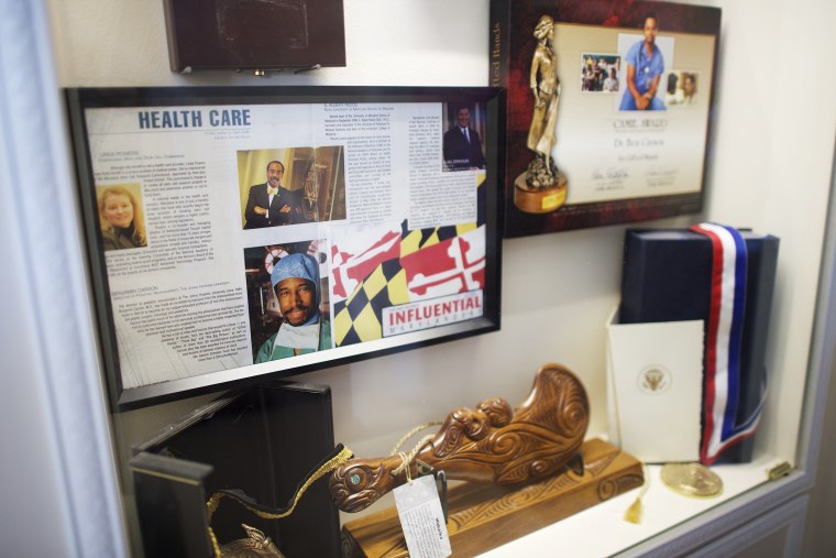 A display case with memorabilia is pictured in Dr. Benjamin Carson's residence in Upperco, Md. on Nov. 27, 2014. (Photo by Mark Makela)