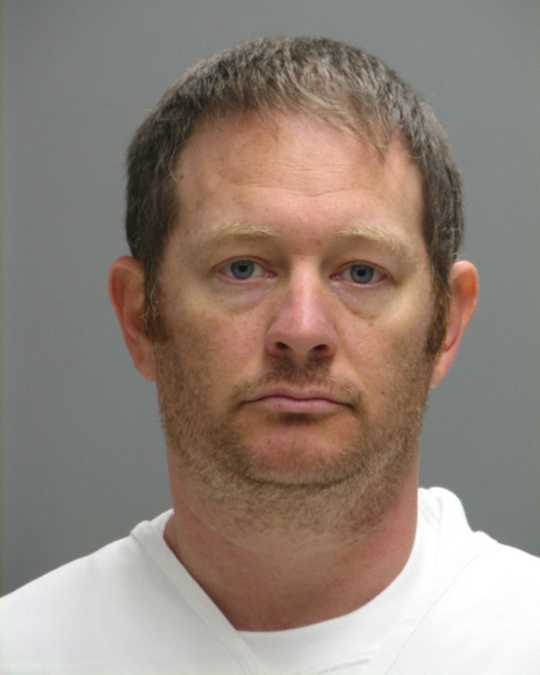 A booking photo shows Lee Robert Moore. (Photo by Delaware Department of Justice/AP)