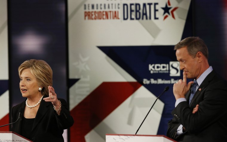 U.S. presidential candidates Hillary Clinton and Martin O'Malley during the second official 2016 U.S. Democratic presidential candidates debate in Des Moines, Ia., Nov. 14, 2015. (Photo by Jim Young/Reuters)
