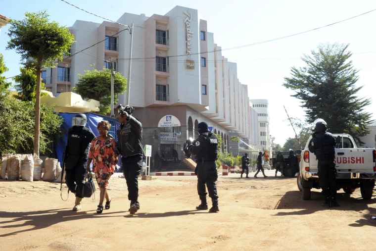 A hostage is saved by agents of the security force at the Radisson Blu hotel in Bamako on Nov. 20, 2015. (Photo by Daou Bakary Emmanuel- Patrick Ertel/REA/Redux)