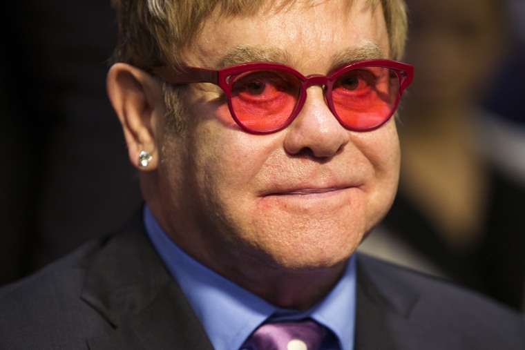Musician Sir Elton John arrives on Capitol Hill in Washington, May 6, 2015, to testify in support of U.S. funding for global HIV/AIDS treatment. (Photo by Evan Vucci/AP)