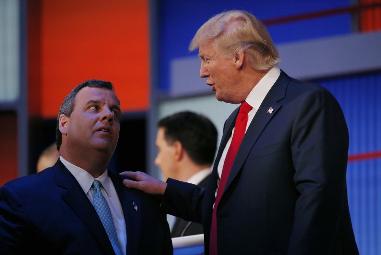 Republican 2016 U.S. presidential candidates Chris Christie and Donald Trump talk during a commercial break in the first official Republican presidential debate of the 2016 campaign in Cleveland, Ohio, Aug. 6, 2015. (Photo by Brian Snyder/Reuters)