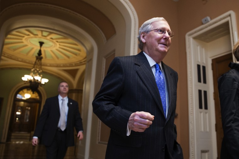 Senate Majority Leader Mitch McConnell, R-Ky., walks from the chamber as Republicans pushed legislation toward Senate approval to defund Planned Parenthood and the ACA, on Capitol Hill in Washington, Dec. 3, 2015. (Photo by J. Scott Applewhite/AP)