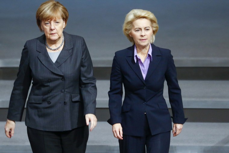German Chancellor Angela Merkel and Defense Minister Ursula von der Leyen (R) walk during a session of the Bundestag, the German lower house of parliament, in Berlin, Germany, Dec. 4, 2015. (Photo by Hannibal Hanschke/Reuters)