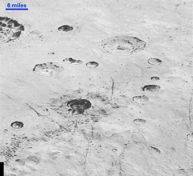 Layered Craters and Icy Plains on Pluto. This image from NASA’s New Horizons spacecraft reveals new details of Pluto’s rugged, icy cratered plains, including layering in the interior walls of many craters. (Photo by NASA/JHUAPL/SwRI)