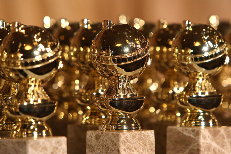 Golden Globe statuettes are on seen on display. (Photo by Frazer Harrison/Getty)