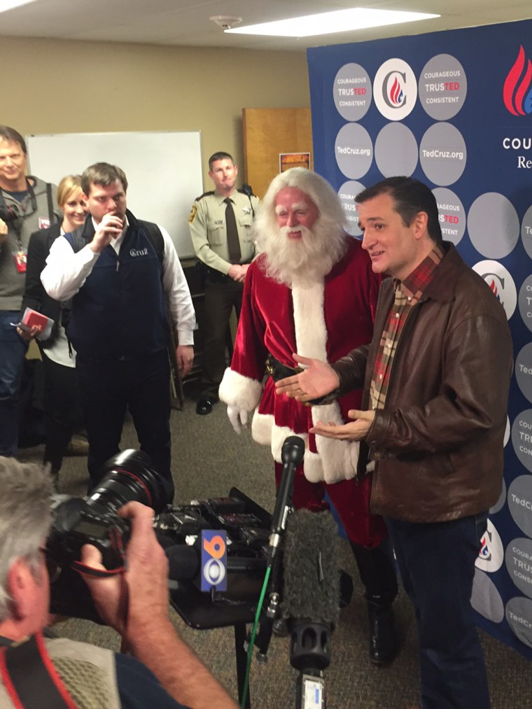Ted Cruz addresses the press beside 'Santa Claus' on Dec. 17, 2015. (Photo by Benjy Sarlin/MSNBC)