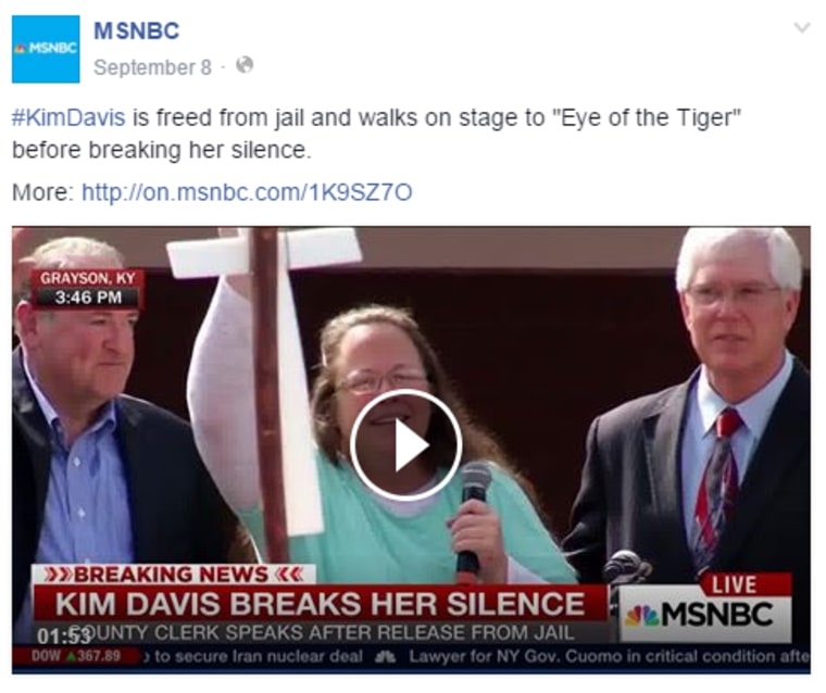‪#‎KimDavis‬ is freed from jail and walks on stage to \"Eye of the Tiger\" before breaking her silence.