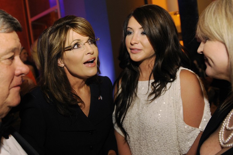 Former Governor of Alaska Palin talks with her daughter Bristol as she arrives at embassy of Italy for MSNBC after-party in Washington