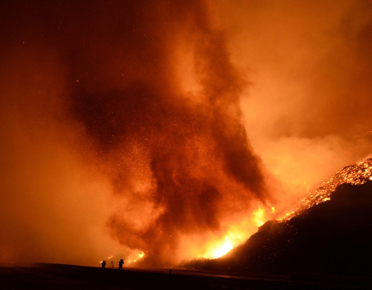 Huge fire and tornados form during the Solimar brush fire that started early Saturday morning in Ventura County, Calif., Dec. 26, 2015. A wildfire in Southern California burned over 1,000 acres of land. (Photo by Gene Blevins/Reuters)