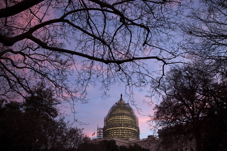 The U.S. Capitol building stands at daybreak in Washington, D.C., on Dec. 11, 2015. (Photo by Drew Angerer/Bloomberg/Getty)